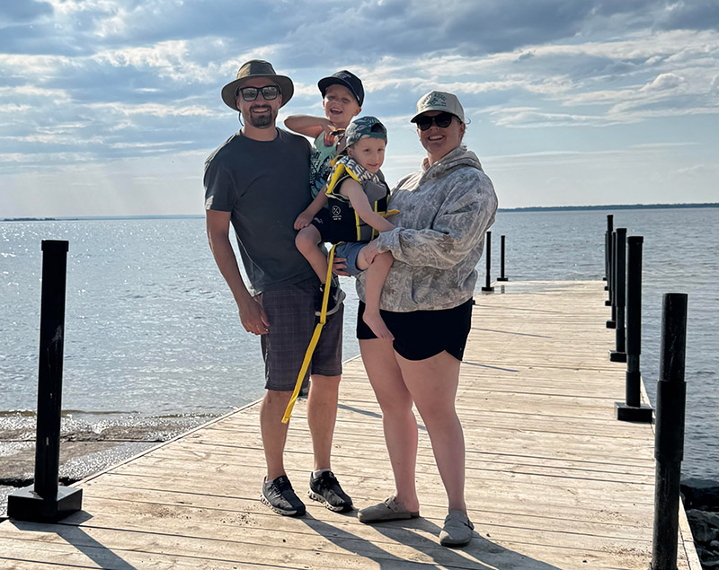 Photo of Ryan, Carly, and their two children